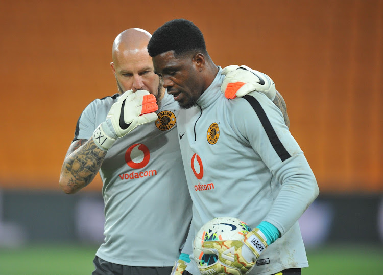 Kaizer Chiefs goalkeeper Daniel Akpeyi listens to instructions from goalkeeper coach Lee Baxter before an Absa Premiership match.