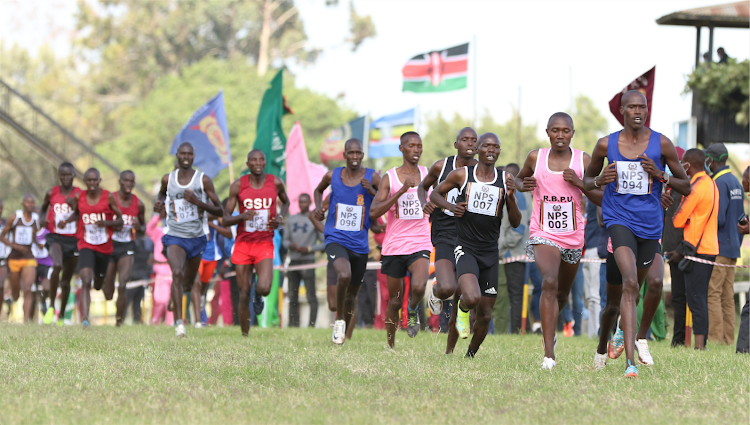 Athletes compete during the National Police Service Cross Country Championship at Ngong' Race Course, Nairobi