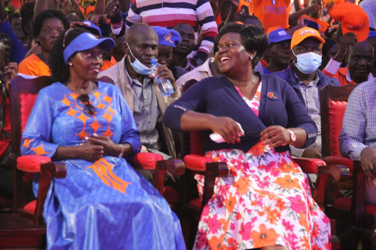 Azimio presidential running mate Martha Karua and Homa Bay governor candidate Gladys Wanga in Homa Bay town on June29