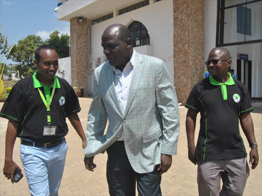 Kilifi North RO Guliya Abidwahid,IEBC chairman Wafula Chebukati and Malindi RO Masha Sudi at the Malindi Airport on March 7, 2018. /ALPHONCE GARI