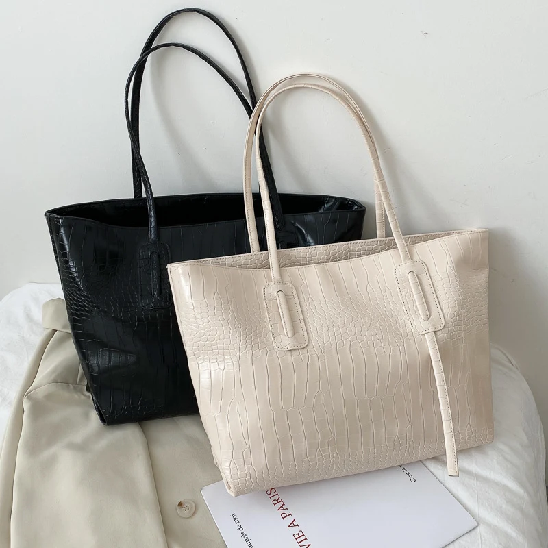 Sac fourre-tout femme épaule, simple et grande capacité, idéal pour le quotidien, pratique et élégant, parfait pour transporter vos affaires.