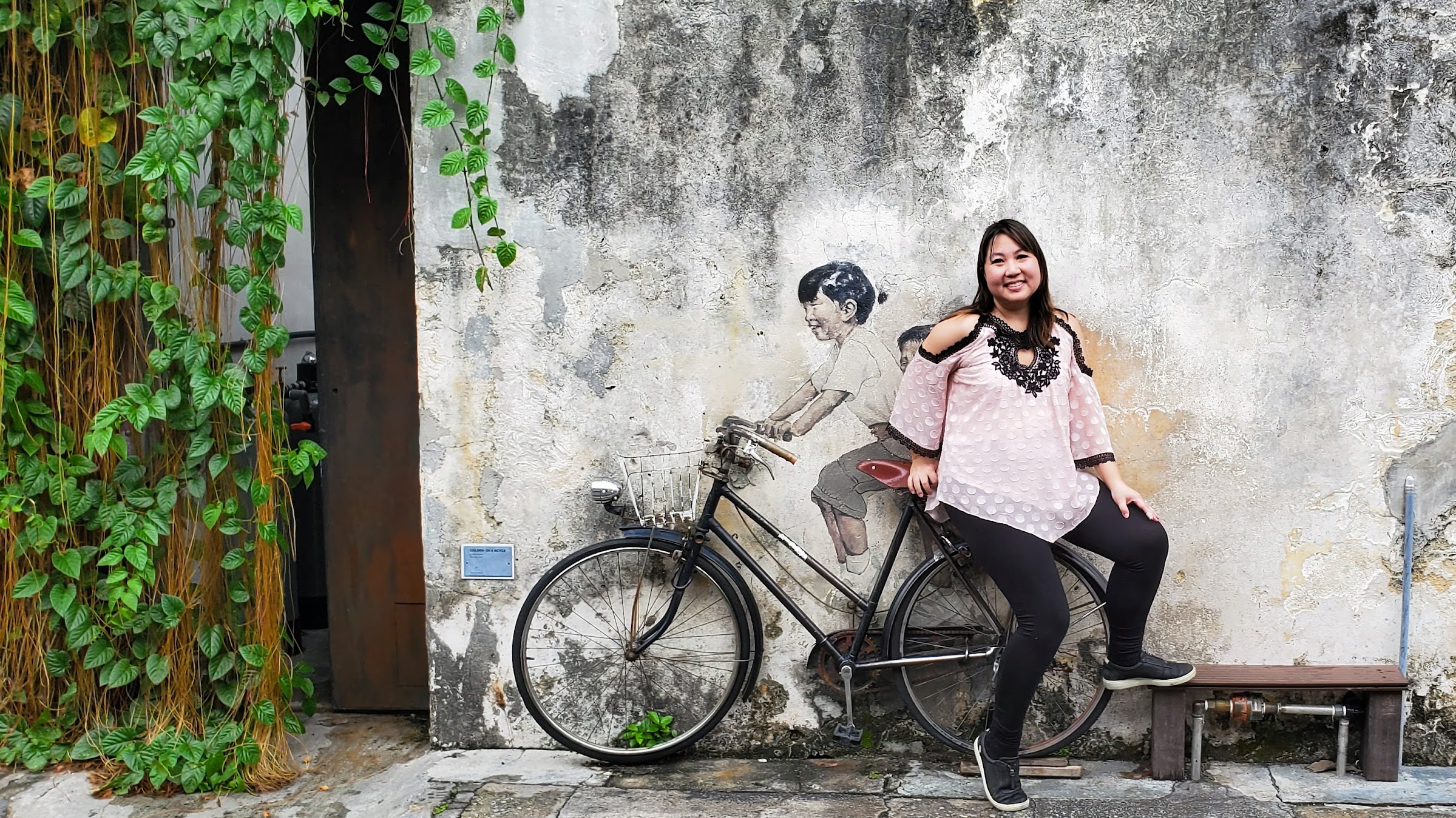 Tips on visiting George Town Street Art: Little Children on a Bicycle on Armenian Street. The most famous street art are the ones from Ernest Zacharevic commissioned as part of a Mirrors George Town street art initiative and which are now considered iconic to George Town