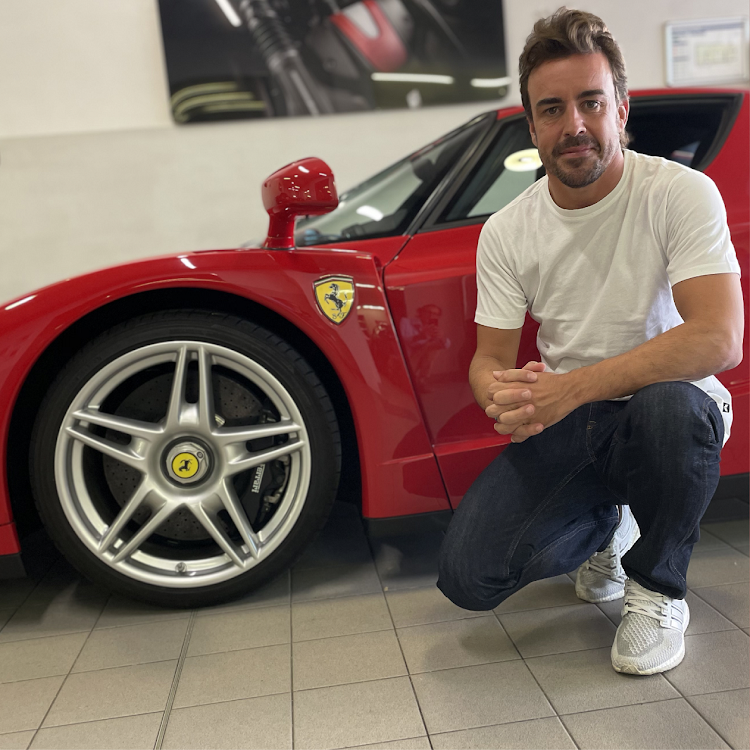 Fernando Alonso with his Ferrari Enzo. Picture: SUPPLIED