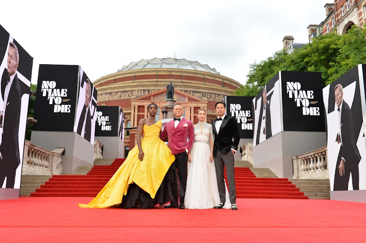 Left to right: Lashana Lynch, Daniel Craig, Léa Seydoux, and director Cary Joji Fukunga attend the world premiere of ‘No Time To Die’ at the Royal Albert Hall in London, Britain, September 28 2021. Picture: JEFF SPICER/GETTY IMAGES