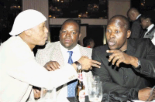 JOHANNESBURG, SOUTH AFRICA - 18 May 2006, Doctor Khumalo, Mandla Sithole and Mike Mangena during Lucas Radebe Gala Dinner at the Sandton Sun & Towers in Johannesburg, South Africa.Photo by Lefty Shivambu / Gallo Images