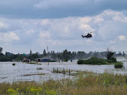 An Oryx helicopter airlifted an elderly couple to safety after flooding in the Loch Vaal area at the weekend.