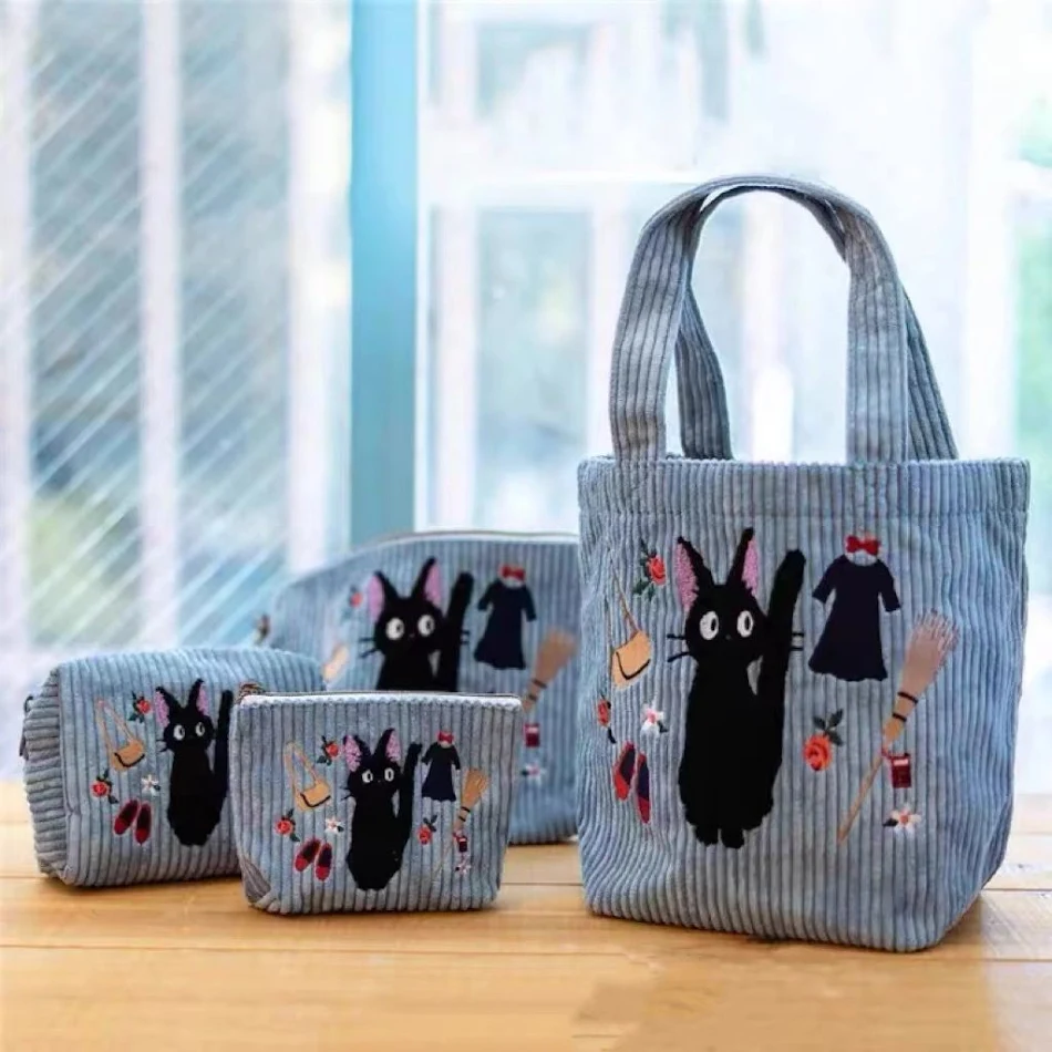 Handtasje met ritssluiting, borduursel en corduroy voor make-up. Bewaar uw cosmetica stijlvol en veilig in deze handige tas.