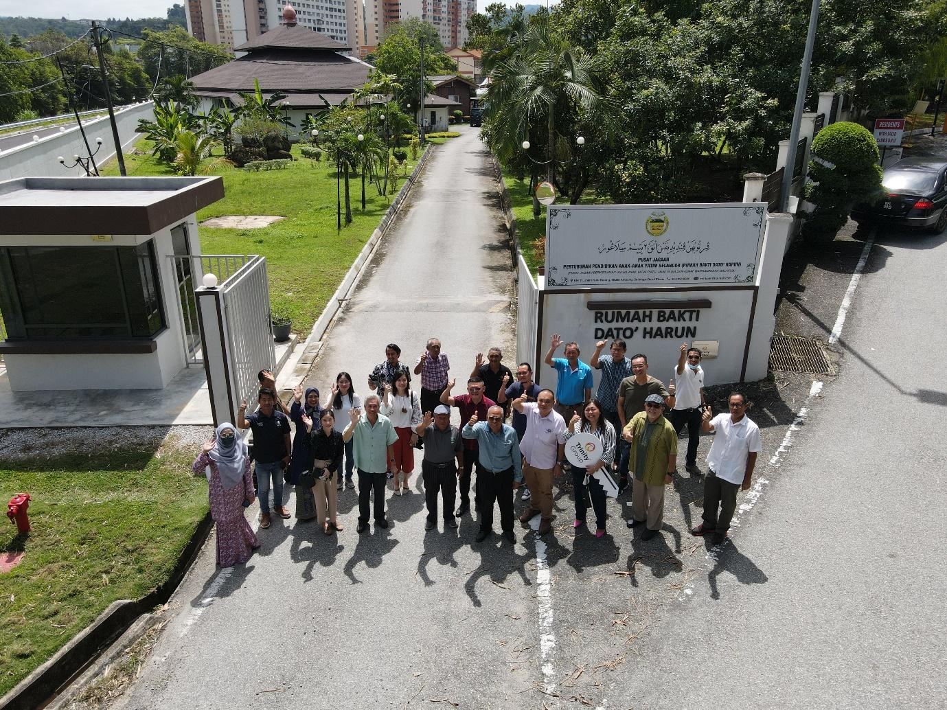 A group of people walking down a street

Description automatically generated with low confidence