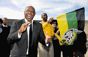 Tokyo Sexwale with the Nelson Mandela Bay ANC regional chairman, Nceba Faku, and ANC Veterans League members at the Emlotheni memorial site. File photo.