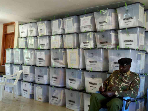 A police officer guards ballot boxes in Eldoret after the August 8, 2017 general election.