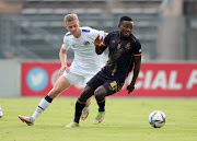 Victor Letsoalo of Royal AM challenged by Jesse Donn of Supersport United. Letsoalo has 11 goals this season.