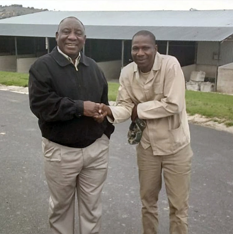 Bennet Mashinini with President Cyril Ramaphosa in happier times before the cattle farm worker was fired.