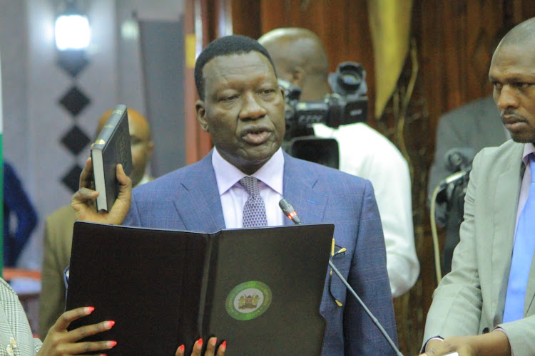 Energy and Petroleum CS nominee Davis Chrichir taking oath before vetting on Tuesday.