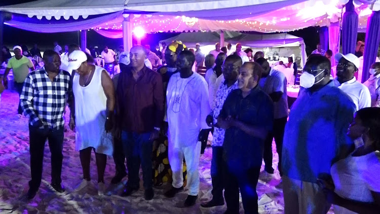 Former MP Maina Kamanda Nairobi Governor AnnKananu, Peter Kenneth, ODM Party leader Raila Odinga, Kilifi Senator Stewart Madzayo, Mombasa businessman Suleiman Shabhal and KIambuu Governor James Nyoro usher in New year at Bofa in Kilifi at the luxurious home of COTU Boss Francis Atwoli