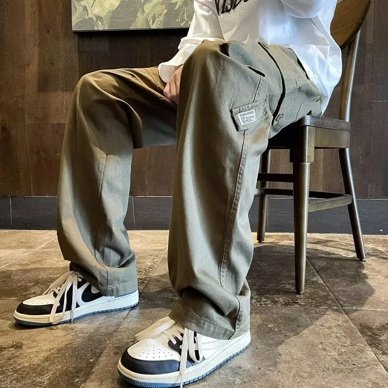Pantalones casuales finos para hombre con múltiples bolsillos, ideales para uso diario. Cómodos y prácticos, perfectos para un estilo versátil.
