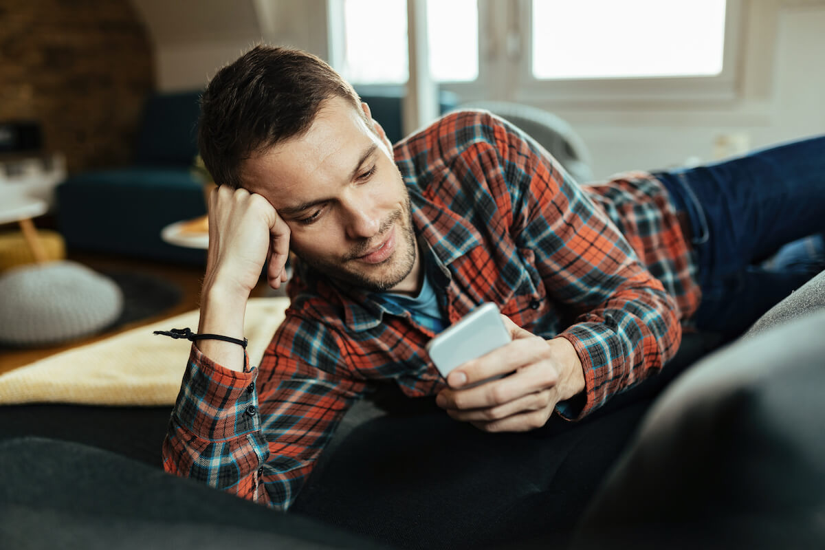 Patient engagement software: man using his phone