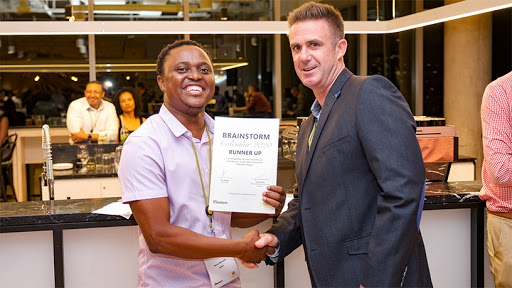 Runner-up Percy Maimela recieving his award from Mark Jackman, Huawei business unit executive at  iOCO. (Photo: PaulMcGavin). (Photo: PaulMcGavin)