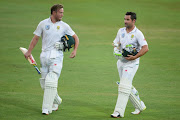 AB de Villiers and Dean Elgar of the Proteas walk off due to bad light stopping play during day 3 of the 2nd Sunfoil Test match between South Africa and India at SuperSport Park on January 15, 2018 in Pretoria, South Africa. 