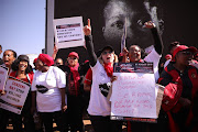 Women take part in the #TotalShutdown march in Pretoria on August 1, 2018. 