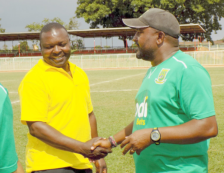 The new Vihiga tactician Sammy Okoth with his Mathare counterpart Francis Kimanzi at Bukhungu on Sunday