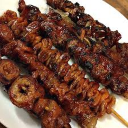 BBQ Isaw On a Stick with Rice, Empanada, Side Soup, & POP