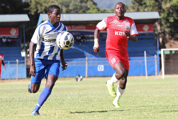 BRIAN MARITA OF AFC ,JOHN NJUGUNA OF ULINZI IMG_0302.jpg Leopards' Brian Marita (L) and Ulinzi's John Njuguna in recent action