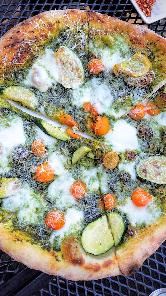 Ken's Artisan Pizza, 12 inch thin crust perfection, this one is the Summer Pesto with zucchini, cherry tomatoes, hazelnut pesto, mozzarella, pecorino romano