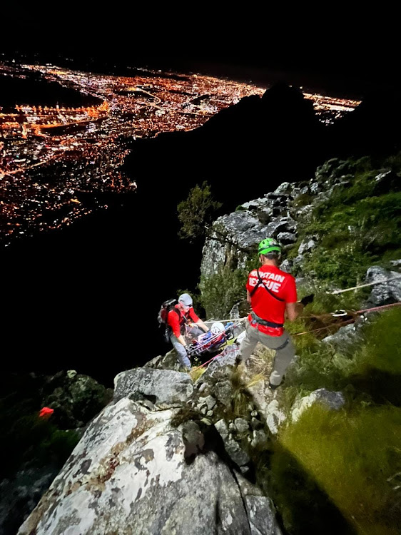 The team, including a provincial health EMS paramedic, abseiled down to the injured climber, who was raised to the top of the cliff in a stretcher.