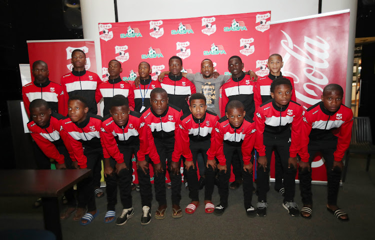 Mamelodi Sundowns midfielder Aubrey Ngoma with COPA Coca-Cola Future Stars squad.