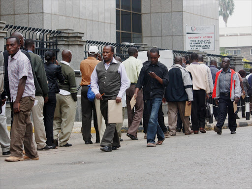 A file photo of taxpayers lining up along Harambee Avenue in Nairobi where Kenya Revenue Authority is located.