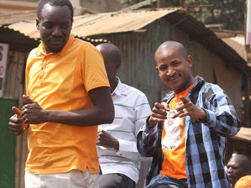 Dagoretti North MP Simba Arati with Embakasi East's Babu Owino during Nasa's meet-the-people campaign tour in Kangemi, Nairobi, September 23, 2017. /ENOS TECHE