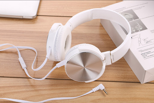 Title 2, Head-mounted stereo bass headset. Experience im...