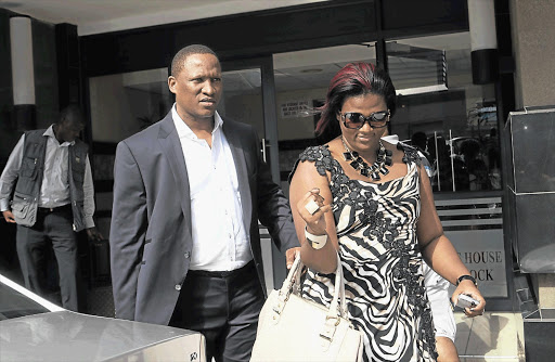 Sbu and Shauwn Mpisane leave the Durban Commercial Crime Court.