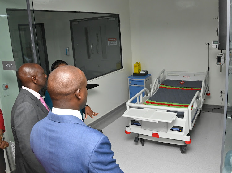 President William Ruto visiting patients during the official opening of a level five AAR Hospital in Kiambu on February 15, 2023