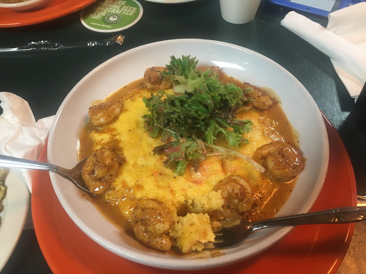 Shrimp and grits with arugula salad