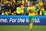 Steven Pienaar of South Africa urges his team mates on during the 2010 FIFA World Cup South Africa Group A match between France and South Africa at the Free State Stadium on June 22, 2010 in Mangaung/Bloemfontein, South Africa. 