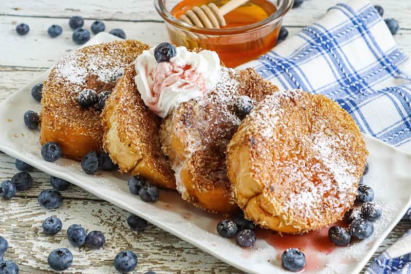 A Platter Of Honey Blueberry Stuffed French Toast.
