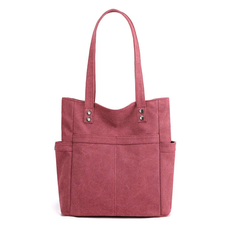 Sac à bandoulière en toile pour femmes, grande capacité, anse unique. Transportez tout avec élégance et confort, parfait pour le quotidien.