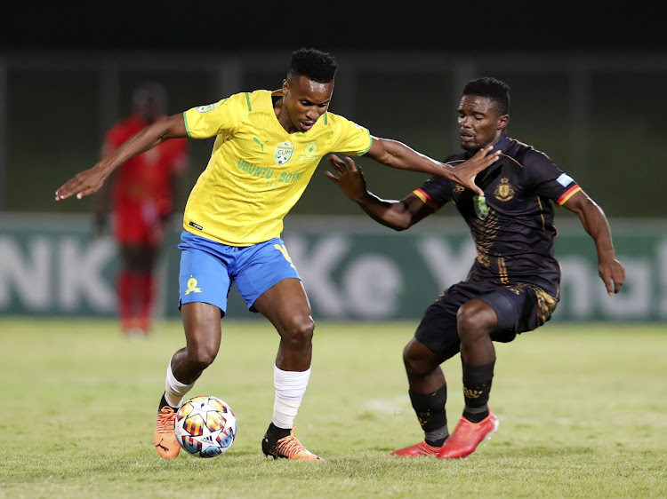 Themba Zwane of Mamelodi Sundowns shields the ball from Sphesihle Msomi of Royal AM during their Nedbank Cup semifinal at the Chatsworth Stadium.