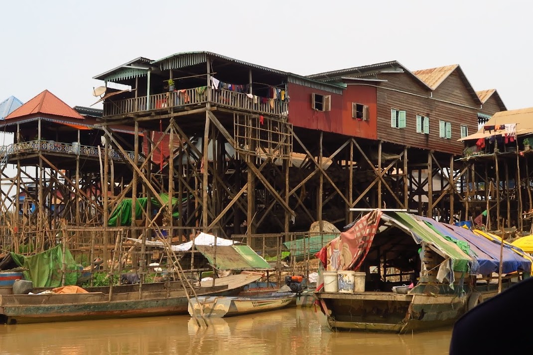 boat trip downstream from the stilt village of Kampong Kheang to a floating village in the middle of Tonle Sap and back