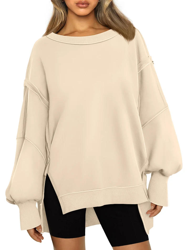 Modieuze damessweater met ronde hals en capuchon