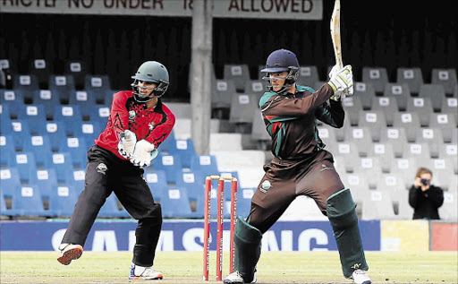 WORLD RECORD: Border’s Marco Marais plays a shot during the match against Eastern Province at Buffalo Park yesterday. The EP keeper is Matthew Christensen Picture: ALAN EASON