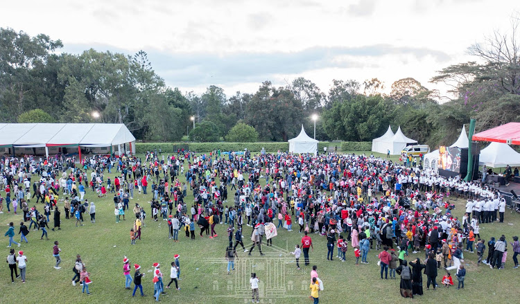 President Uhuru Kenyatta and First Lady Margaret Kenyatta hosted hundreds of children at State House, Nairobi for a Christmas party on December 19, 2021.