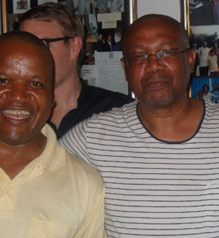 The late acting acting director general of Gauteng Thabo Masebe alongside Dr Khulu Mbatha.