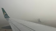 Flights had to be diverted and others grounded at Cape Town International Airport when it experienced technical issues and dense fog.