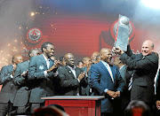 Stan Matthews and SuperSport staff celebrate winning the league on  May 24 2009 in Johannesburg./Lefty Shivambu / Gallo Images