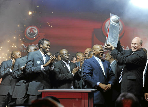 Stan Matthews and SuperSport staff celebrate winning the league on May 24 2009 in Johannesburg./Lefty Shivambu / Gallo Images