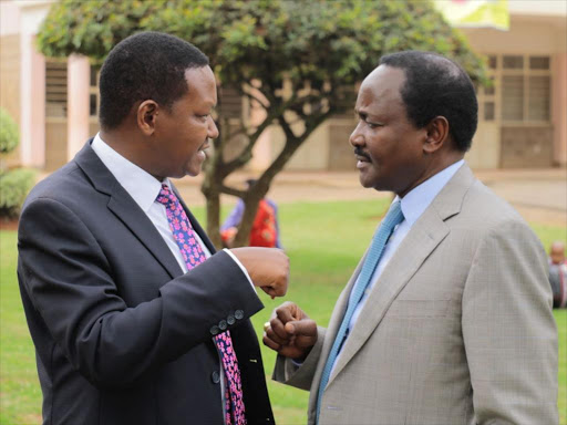 Wiper leader Kalonzo Musyoka and Machakos Governor Alfred Mutua when they met at the wedding of Makueni Governor Kivutha Kibwana at the Karen Community Church, August 4, 2018. /COURTESY