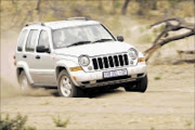 TOUGH: Driver claims it costs a lot to service a Jeep Cherokee. Cicra 2009. Pic. Unknown.