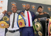 Promoter Ayanda Matiti is flanked from right by Phumelele Cafu and Jackson Chauke. 